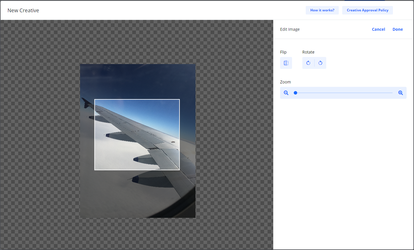Screenshot of the 'New Creative' image editor, showing an image of an airplane wing being cropped with flip, rotate, and zoom controls on the side panel.