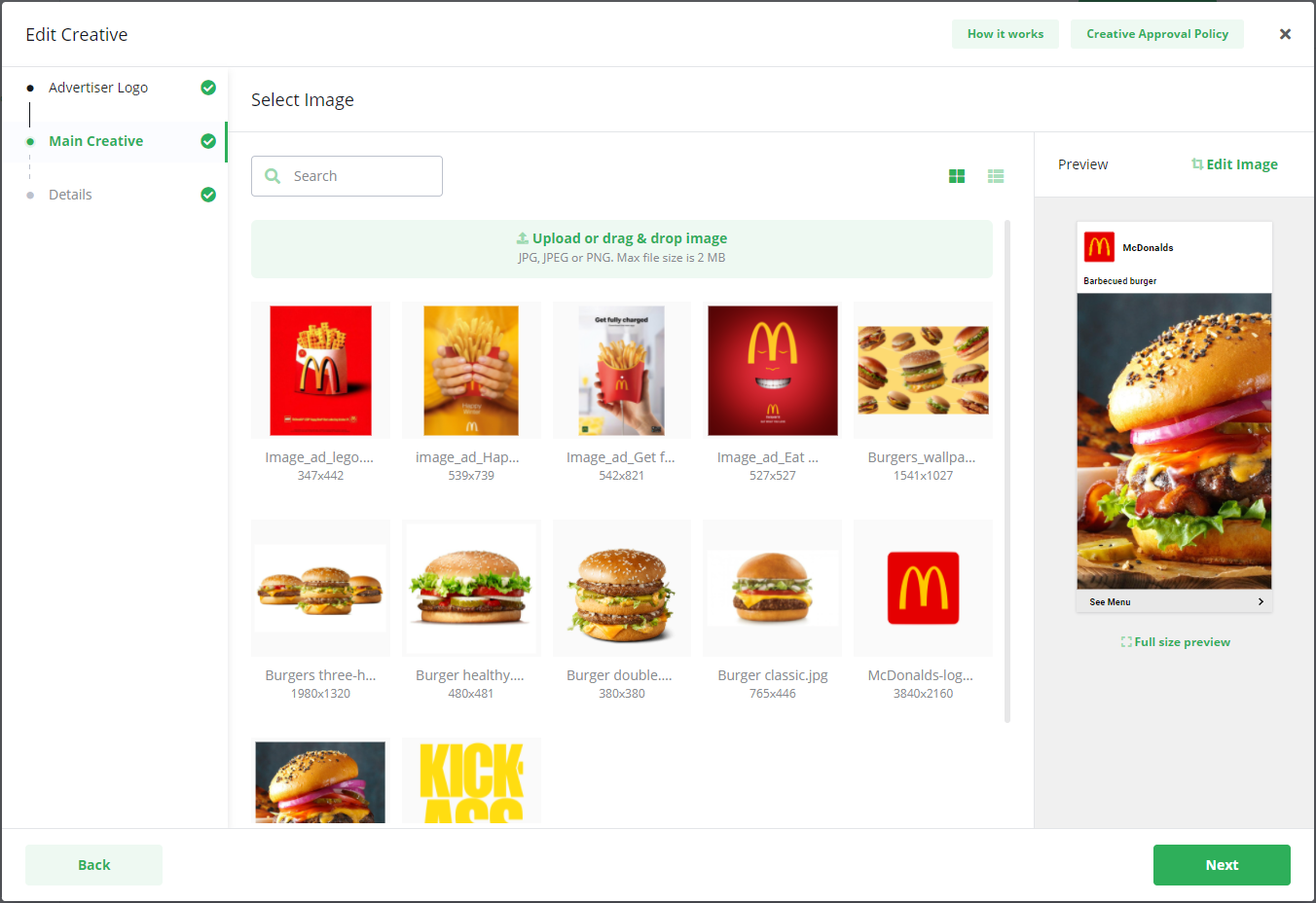 Screenshot of the 'Edit Creative' main creative step, showing an image library and the selection of a main image for an ad.